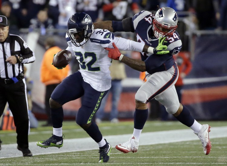 New England Patriots linebacker Dont'a Hightower chases down Seattle Seahawks running back Christine Michael in the first half of Sunday night's game. Jamie Collins' departure has put added pressure on Hightower.
