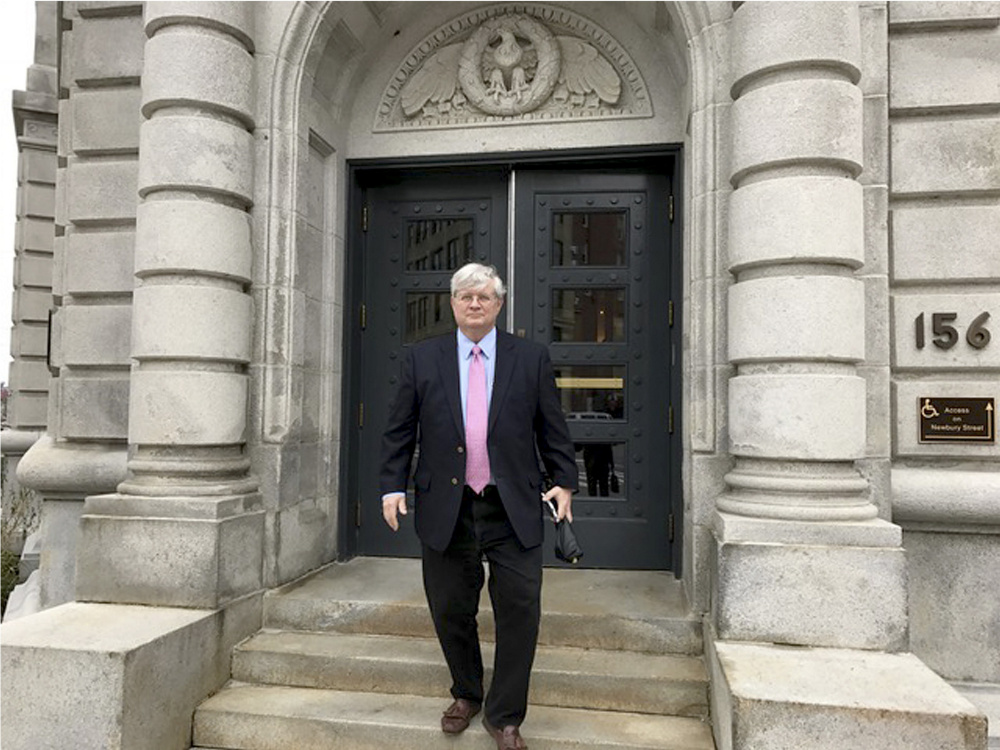 Dr. Joel Sabean leaves Portland's courthouse after closing arguments in his trial. He was found guilty of tax evasion and distributing controlled drugs.
