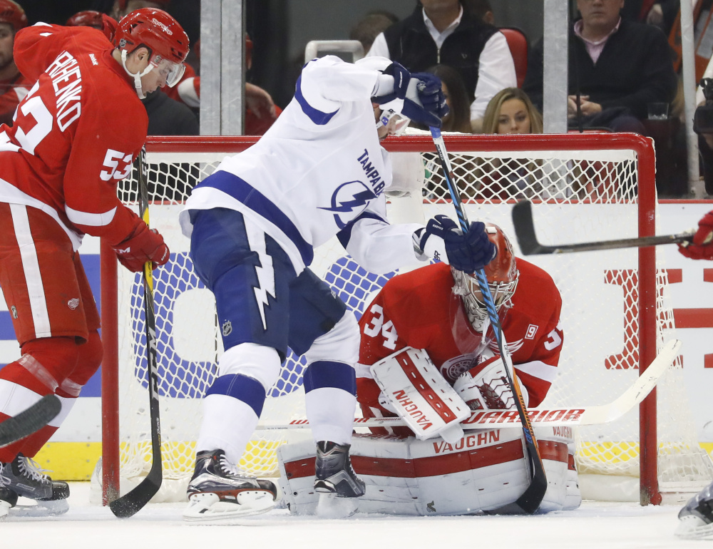Red Wings goalie Petr Mrazek stops a shot by Tampa Bay's Alex Killorn in the second period Tuesday night in Detroit. The Lightning won, 4-3.
