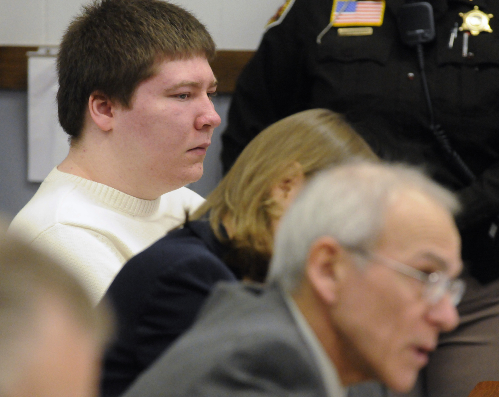 Brendan Dassey, left, listens to 2010 testimony at the Manitowoc County Courthouse in Manitowoc, Wis. Dassey, whose homicide conviction was overturned in a case profiled in the Netflix series "Making a Murderer" was ordered released from federal prison while prosecutors appeal.