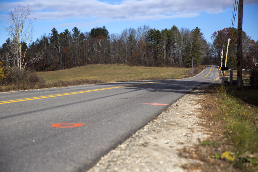 Brandon Dumond was killed after being struck by a car while riding his bicycle along this stretch of Anderson Road in Windham on Wednesday evening. A Scarborough man has been charged.