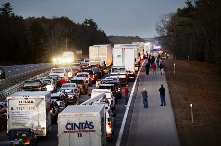 Traffic backed up for miles on the Maine Turnpike after the fatal crash Nov. 18 in Wells. Investigators say the driver of the box truck that crashed into a car had more than 20 convictions for driving violations.