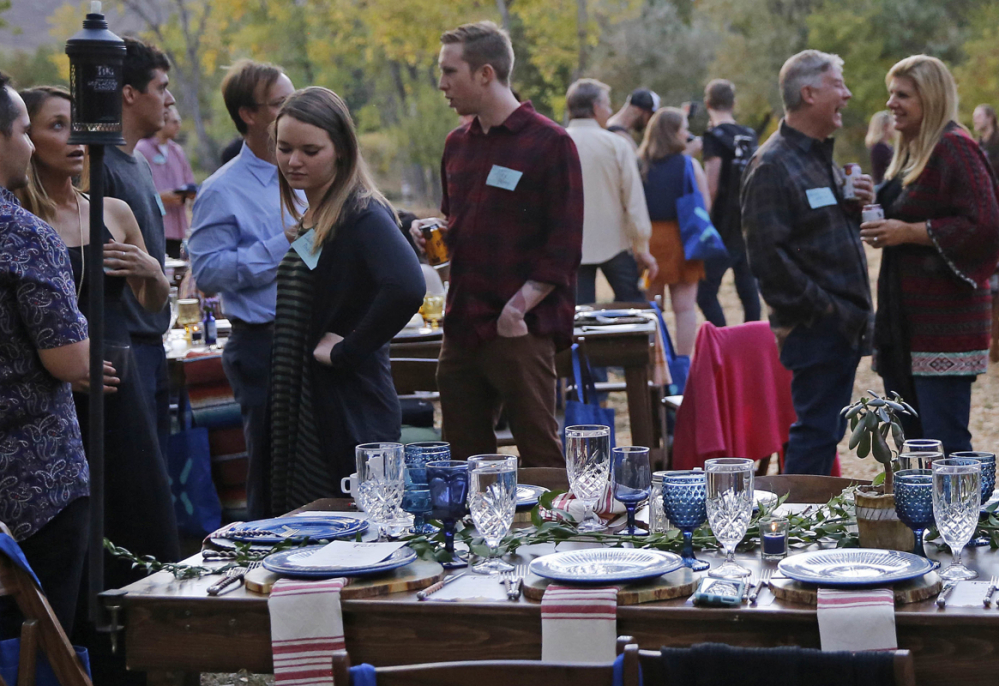 Diners chat and smoke marijuana at Planet Bluegrass in Lyons, Colo., last month. More than 60 percent of Americans now live in states that have approved medical or recreational pot.