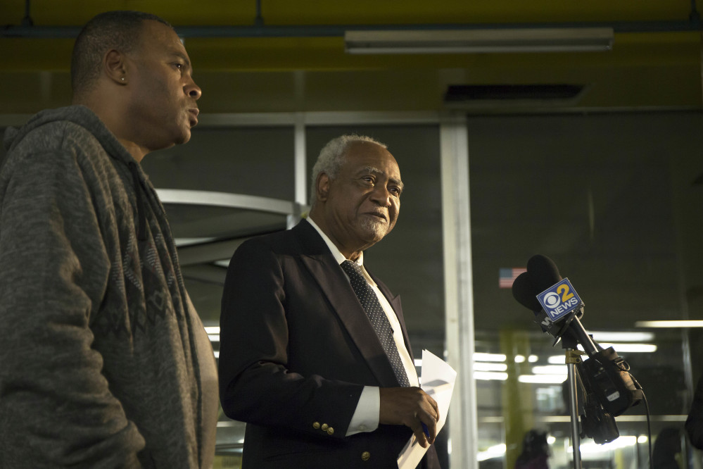 U.S. Rep. Danny Davis, D-Ill., center, and his son, Stacey Wilson, give a news conference at the 5th District police department in the Englewood neighborhood of Chicago. Fifteen-year-old Javon Wilson, the grandson of Danny Davis and son of Stacey Wilson, was shot and killed Friday evening. Javon was a high school sophomore.