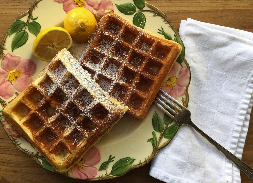 The French crepe treatment of powdered sugar and lemon lets the lush-but-light nature of these waffles shine through.