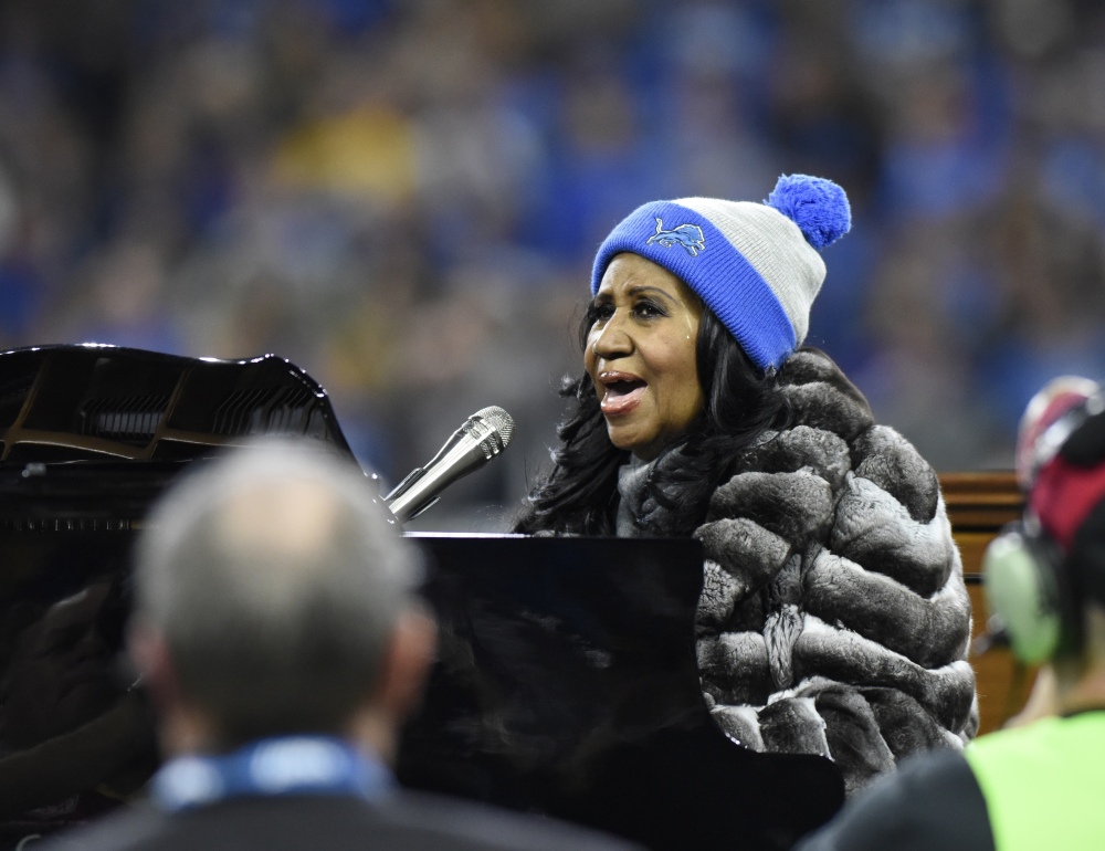 Aretha Franklin performs the national anthem before an NFL football game between the Detroit Lions and the Minnesota Vikings, Thursday, Nov. 24, 2016 in Detroit.