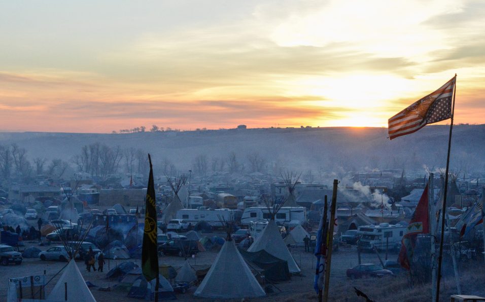 The sun rises over Oceti Sakowin camp during the protest against plans to build the Dakota Access pipeline near the Standing Rock Indian Reservation, near Cannon Ball, N.D.