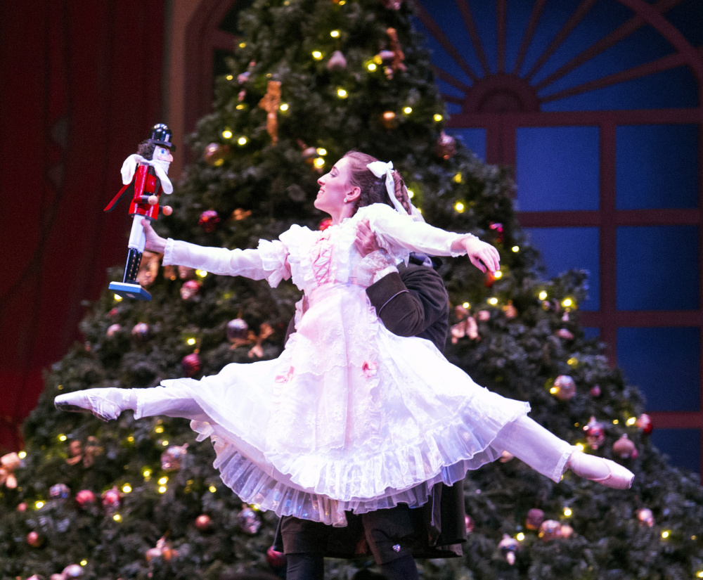 Maine State Ballet dancer Adrienne Pelletier takes to the air as she performs the part of Clara during a dress rehearsal. The versatile dancer also dances the role of Coffee from Arabia. 