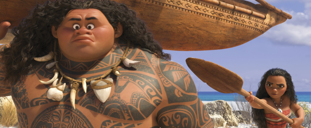 Maui, voiced by Dwayne Johnson, left, and Moana, voiced by Auli'i Cravalho, share a scene from the animated film, "Moana."