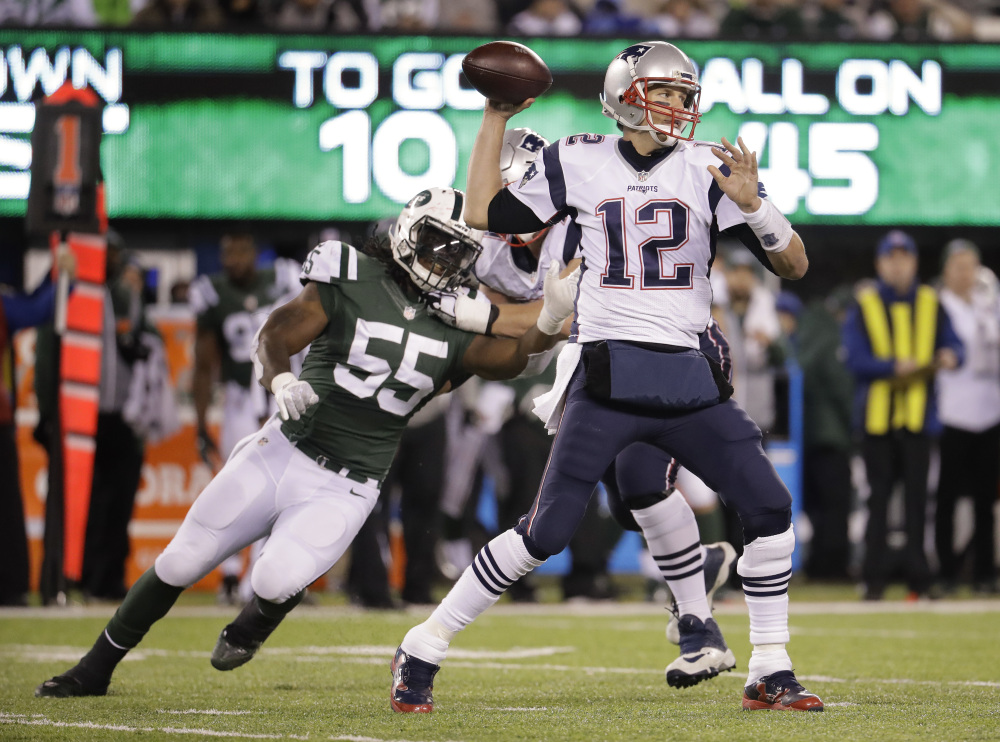 It was a day of milestones for Patriots quarterback Tom Brady, who got his 200th career win and also surpassed the 60,000-yard passing mark for his career while leading New England to a 22-17 win over the Jets.