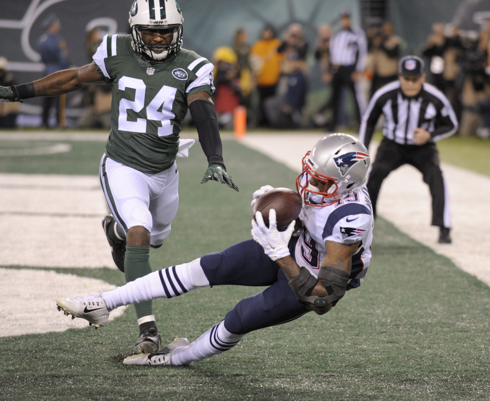 Patriots rookie wide receiver Malcolm Mitchell burned Jets cornerback Darrelle Revis for a pair of touchdowns in New England's 22-17 win Sunday night.