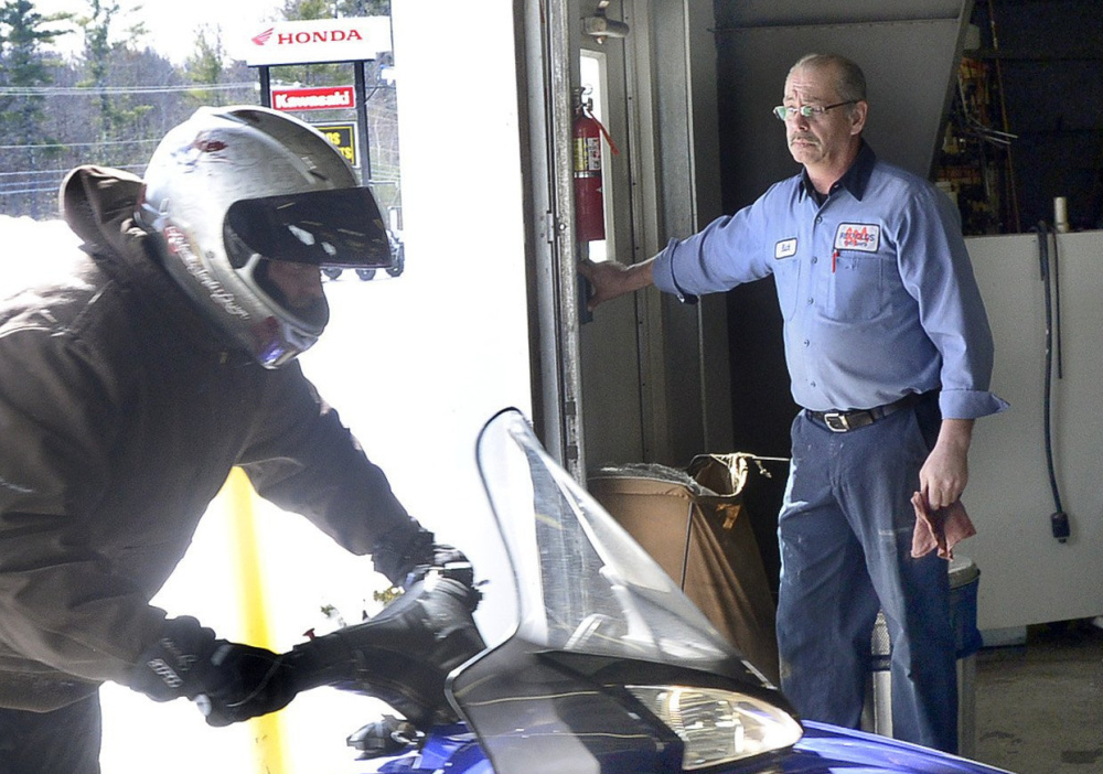 Richard Diekema opens the door at Reynolds Motorsports in Buxton. He worked there for 31 years and was the company's head mechanic. His mother said he could fix anything.