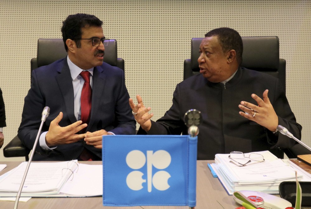 Mohammed Bin Saleh Al-Sada, minister of energy and industry of Qatar and president of the OPEC conference, left, talks with Mohammad Sanusi Barkindo, OPEC secretary general of Nigeria prior to the start of a meeting of the Organization of the Petroleum Exporting Countries at its headquarters in Vienna, Austria, on Wednesday.