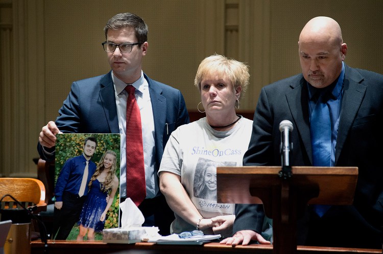 William, right, and Susan Garland speak in Androscoggin County Superior Court in Auburn on Tuesday. Their son, Connor, was with his girlfriend, Cassidy Charette, on the night in 2014 when Charette died in a hayride crash at Harvest Hill Farm. Attorney Alexander Spadinger holds a picture of Connor Garland and Charette.
Daryn Slover/ Sun Journal via AP
