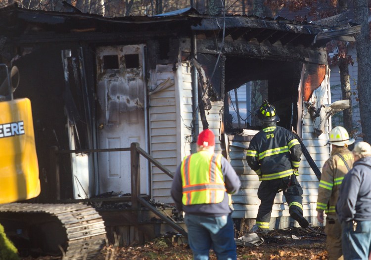 The scene in the aftermath of the fire at 10 Pettingill Road that killed Marie McAllister early Friday morning in Windham. 