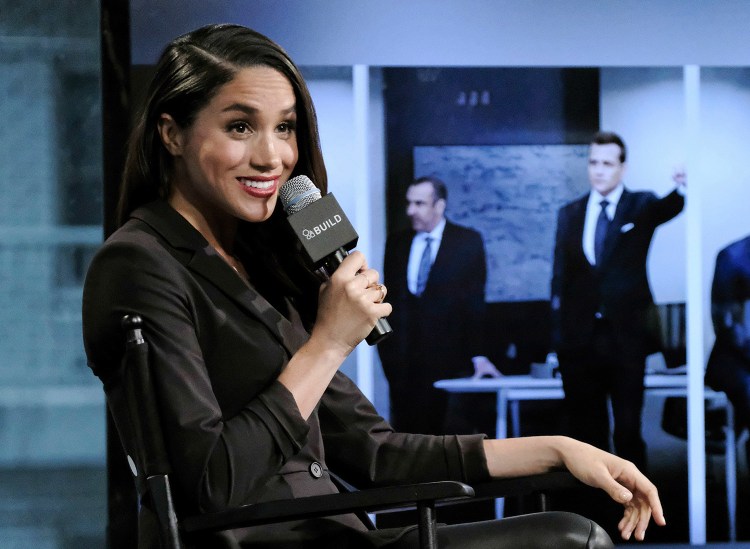 Actress Meghan Markle discusses her role on the television show "Suits" in New York in March. Britain's Prince Harry has condemned what he characterized as racist abuse and harassment of Markle, his girlfriend, in the media.