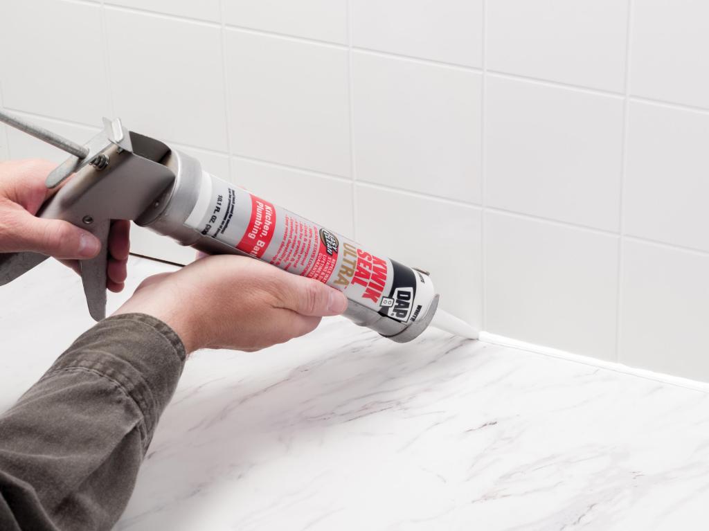 Make bathroom and kitchen areas looks new again by removing the old caulk, and re-caulking.