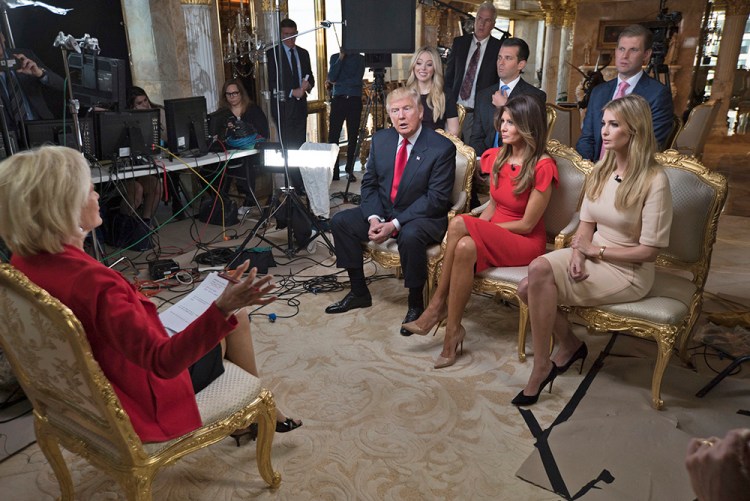 "60 Minutes" correspondent Lesley Stahl interviews President-elect Donald J. Trump and his wife, Melania, daughter Ivanka, seated right, daughter Tiffany, seated second row from left, and sons Donald Jr. and Eric at his home in New York on Friday. The first post-election interview for television was broadcast on Sunday. <em>Chris Albert for CBSNews/60 Minutes via AP</em>