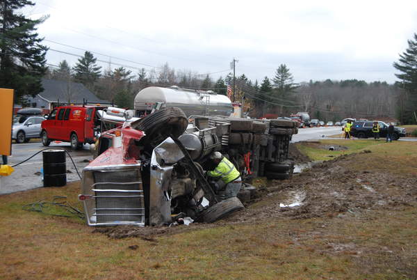 A truck hauling milk was overturned in a crash with a pickup truck on Route 1 in Waldoboro on Wednesday. The driver of the pickup truck died. 