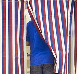 A voter fill out his ballot at Merrill Auditorium in Portland on Election Day 2016.