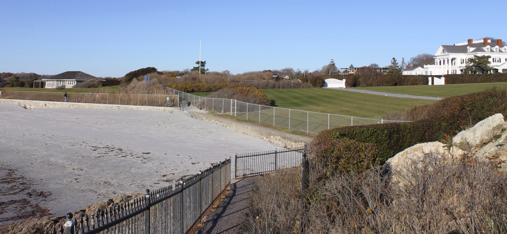 Newport, R.I., officials, environmentalists and residents have complained that the fence, installed earlier this year to replace an old fence, encroaches up to 18 inches onto the Cliff Walk, one of Rhode Island's biggest tourist destinations.