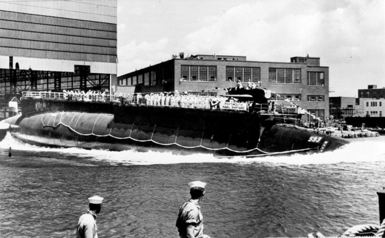 The USS Thresher is launched bow-first at the the Portsmouth Navy Yard in Kittery on July 9, 1960. A Navy submarine that left a Connecticut base this week is carrying the ashes of a veteran to be buried at sea near the site of the USS Thresher's sinking. For half a century Navy Capt. Paul "Bud" Rogers struggled with feelings that it should have been him and not his last-minute replacement on the doomed voyage.