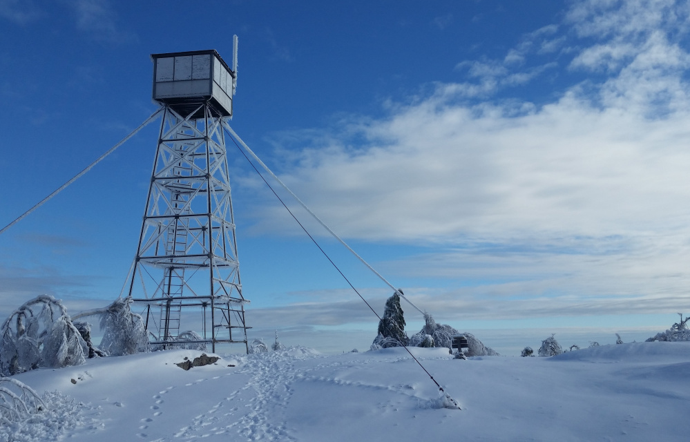 The summit on Pleasant Mountain, which included a hotel from 1873 to 1907, now has a boarded-up Maine Forest Service fire tower and stunning views in all directions.