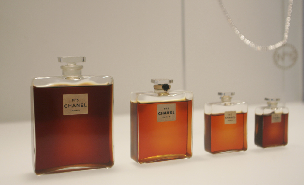Bottles of Chanel No. 5 perfume are displayed at the Metropolitan Museum of Art's Costume Institute exhibit in New York in 2005. Chanel is making a stink over a possible high-speed train line through jasmine fields in Provence.