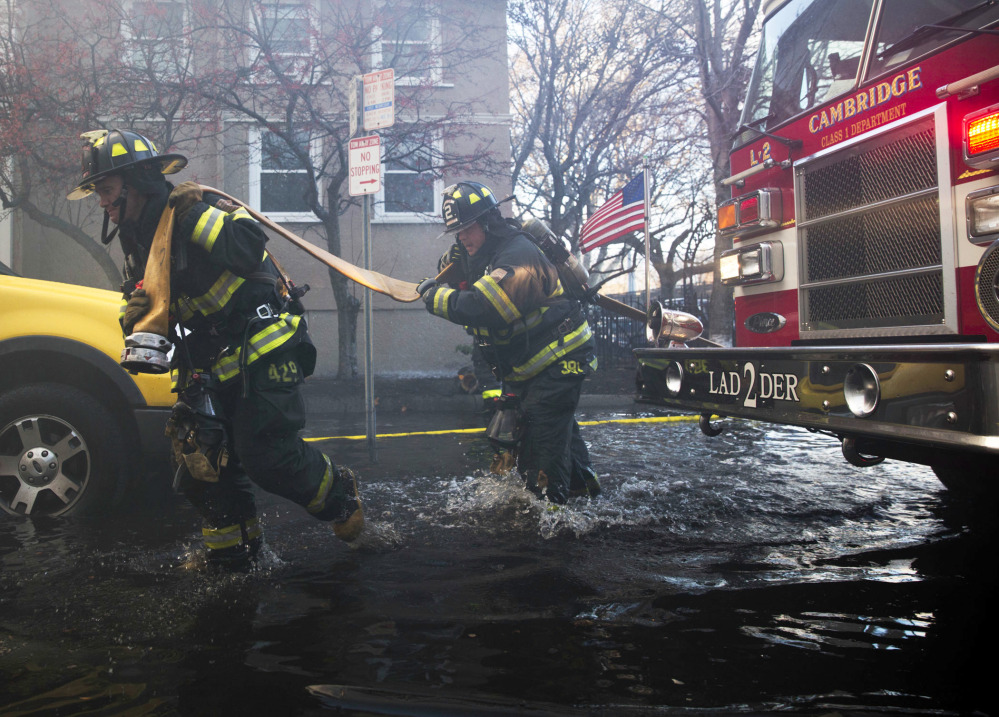 Cambridge and surrounding fire departments battle a fire on and around Berkshire street in Cambridge, Mass., on Saturday.