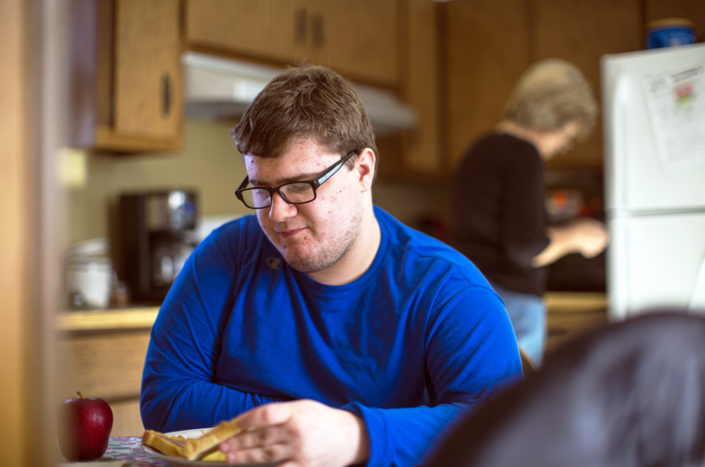 Ryan Dufour, 18, who is diagnosed with autism spectrum disorder, was cut off from services as soon as he graduated from high school in June. Now living with family members in Durham and Freeport, he is on a long waiting list for community-based services, while trends in Maine make those services tougher to find. AT TOP: The last resident leaves the Pineland Center in April 1996, when the New Gloucester facility closed its doors for good.