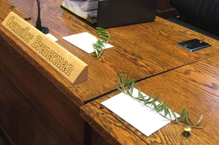 Strimling left an actual olive branch on the dais for each councilor. Some have clashed with the mayor over city health services and a tax break for businesses.