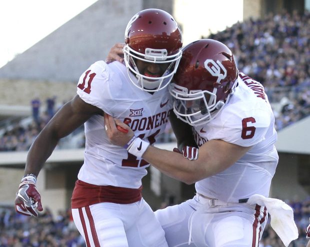 Oklahoma has two Heisman contenders this year in quarterback Baker Mayfield, right, and receiver Dede Westbrook.