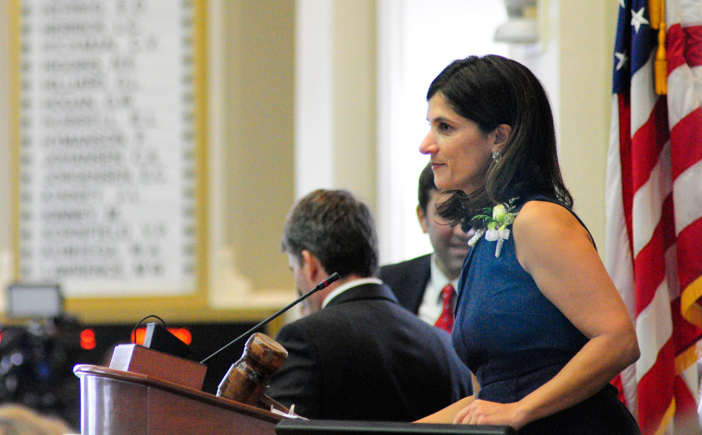 New Speaker of the House Sara Gideon, D-Freeport, hammers the chamber to order. Sen. Mike Thibodeau, R-Winterport, was elected to a second term as Senate president Wednesday.