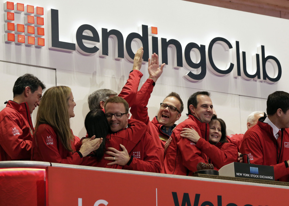 Renaud Laplanche, third from right, former CEO of Lending Club, celebrates the company's IPO at the New York Stock Exchange. He was later forced to resign.