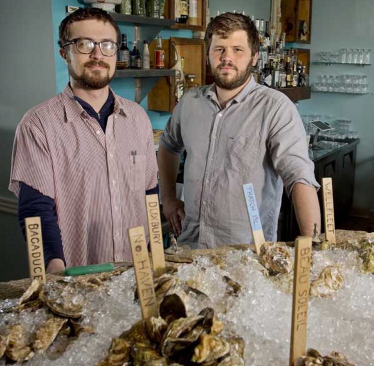 Mike Wiley, left, shown in 2013 with Andrew Taylor, fellow owner and chef of Eventide Oyster Co., says of a planned expansion into Boston: "It's less seasonal down there."