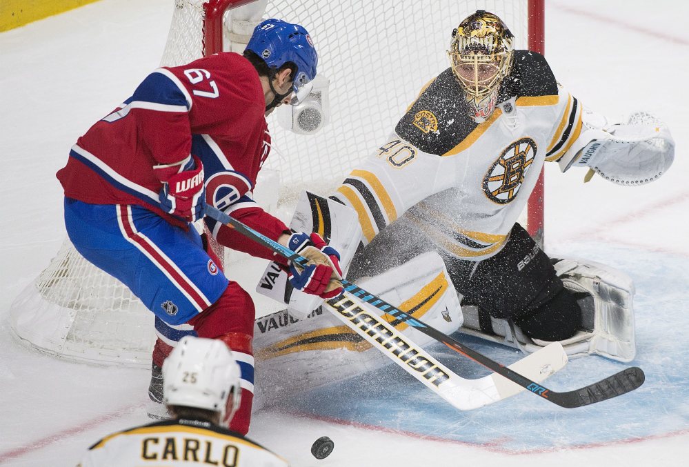 Bruins goaltender Tuukka Rask makes a save against Montreal captain Max Pacioretty in the first period.