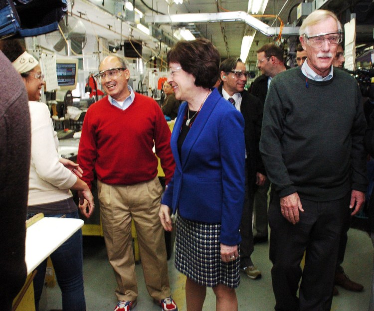 Rep. Bruce Poliquin, left, Sen. Susan Collins and Sen. Angus King tour the New Balance plant in Skowhegan on Wednesday.