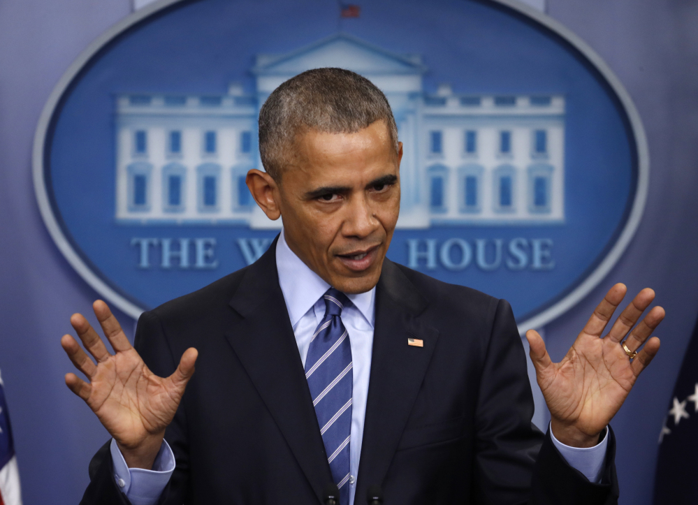President Barack Obama speaks during a news conference in the briefing room of the White House in Washington on Friday.
