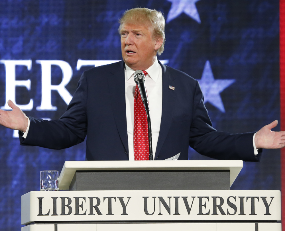 Republican presidential candidate Donald Trump gestures during a speech at Liberty University in Lynchburg, Va. Evangelical leaders were largely critical of Trump, but their congregations delivered him his victory with huge turnout and higher-than-expected margins.