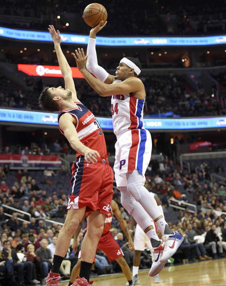 Detroit's Tobias Harris shoots over Washington guard Tomas Satoransky during the first half of a 122-108 win by the Wizards Friday at Washington.