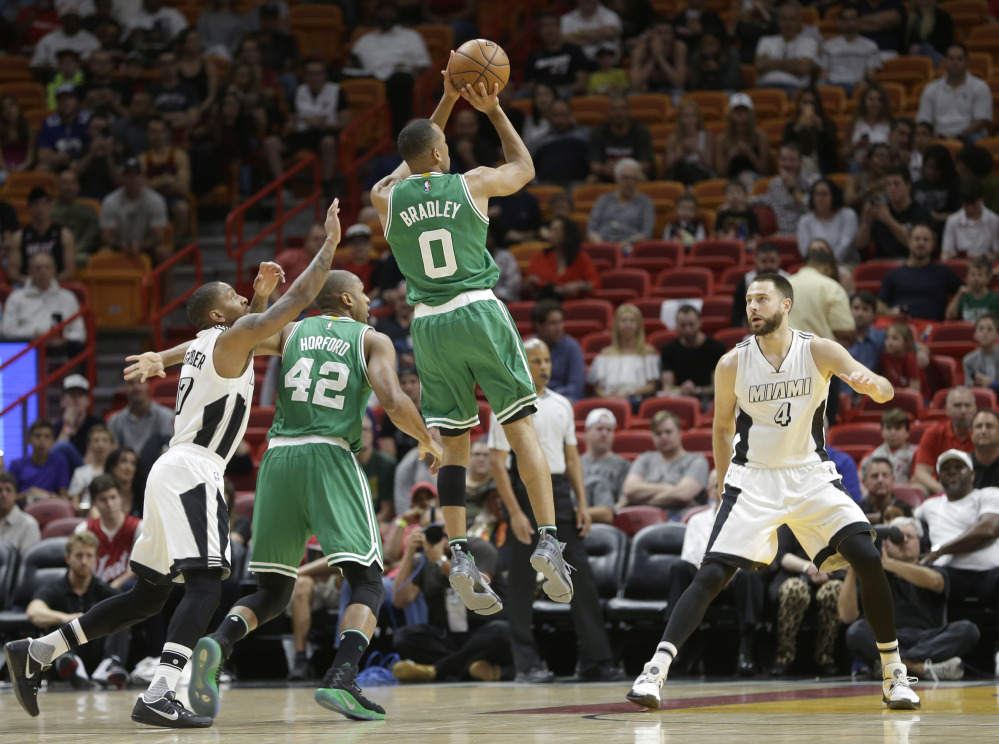 Celtics guard Avery Bradley takes a shot against Miami during Boston's 105-95 win Sunday in Miami.