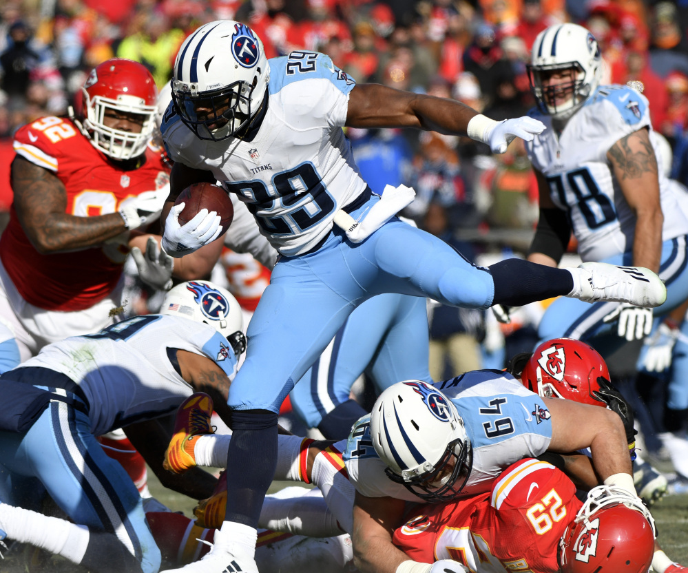Titans running back DeMarco Murray hurdles lineman Josh Kline and Chiefs defensive back Eric Berry during Tennessee's 19-17 win Sunday at Kansas City, Mo.