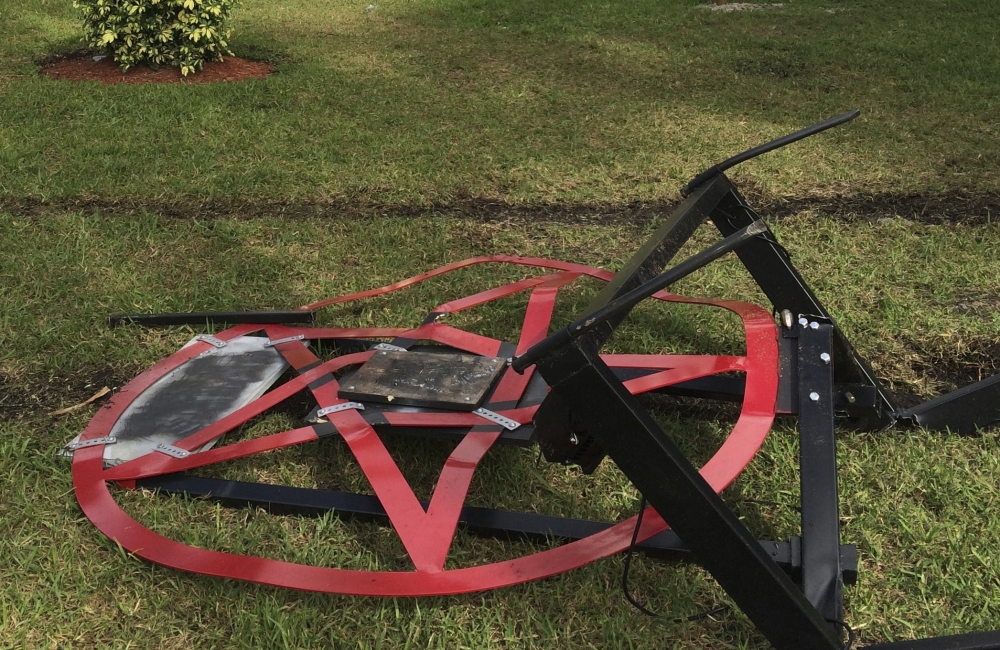 A pentagram erected by atheist Preston Smith lies damaged in Boca Raton's Sanborn Square in Florida on Tuesday.