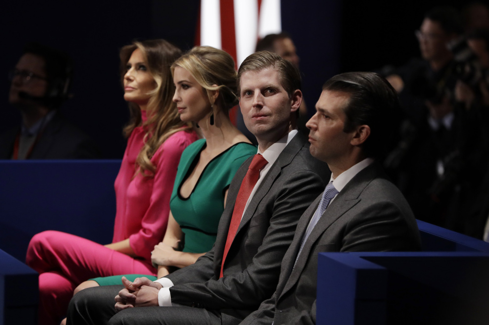 Eric Trump and Donald Trump Jr., with Melania Trump and Ivanka Trump at a St. Louis debate on Oct. 9, were initially listed as leaders of an outdoors excursion for big donors at a Jan. 21 fundraiser.