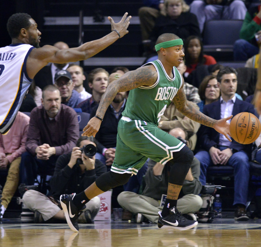 Isaiah Thomas drives past Memphis' Tony Allen in the first half  Tuesday night in Memphis, Tenn. Thomas had 44 points and the Celtics won in overtime, 112-109.