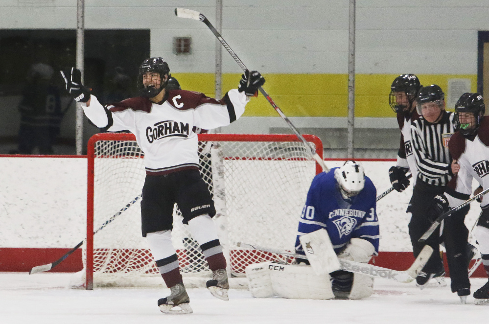 Carter Landry of Gorham celebrates Friday after scoring a second-period goal against Kennebunk at the University of Southern Maine. Kennebunk came away with a 6-4 victory.