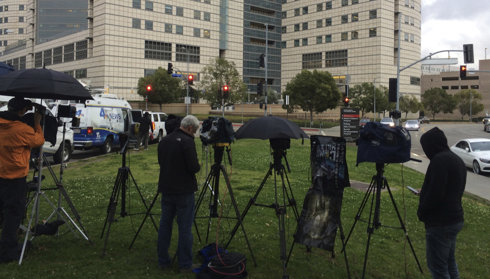 Media personnel camp outside the Ronald Reagan UCLA Medical Center in Los Angeles on Friday. Actress Carrie Fisher was admitted after suffering a medical emergency. Her mother, Debbie Reynolds, tweeted that she was in stable condition.