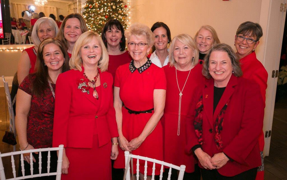Patsy Aprile (front row, second from left), Southern Maine Health Care chief operating officer, was named the American Heart Association's 2016 Crystal Heart Honoree for promoting education about preventing cardiovascular diseases and stroke in women. Also pictured at the Go Red for Women event for York County are colleagues of Aprile's from SMHC (front row, from left) Tina Turgeon, Kim LaChance, Deb Tillotson, Vicki Lyons; (back row, from left) Chris Rossi, Dr. Brandei Wingard, Patti Kasmareck, Helen Troy, Sue Hadiaris and Joanna Salamone.
