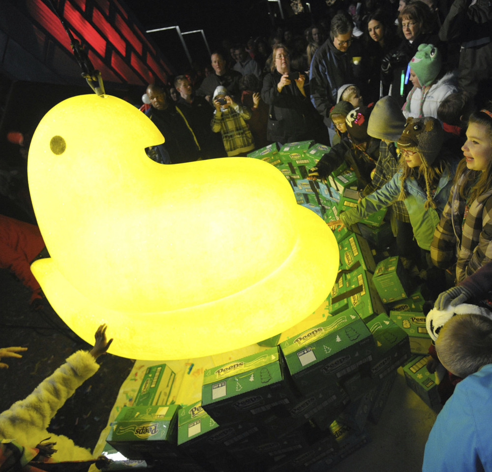 Children gather around a large Peep dropped on New Year's Eve in Bethlehem, Pa., in 2011. 
