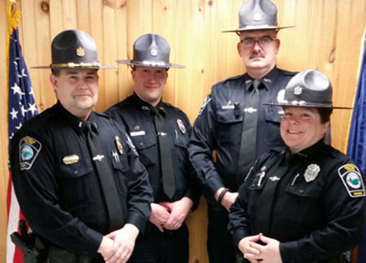 This image from the town of Dixfield's website shows members of the police department. 